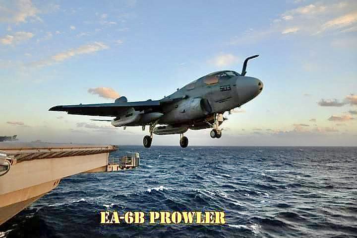 EA-6B Prowler launching off an aircraft carrier over the ocean, captioned EA-6B PROWLER